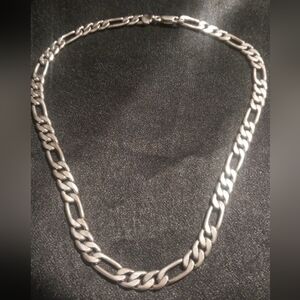 Sterling silver 8 mm men's figero chain 28 inches long. Heavy with lobster clasp